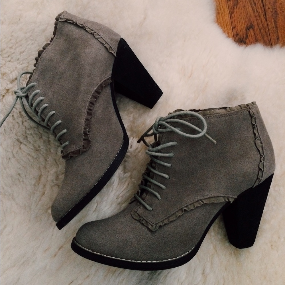Suede ruffle lace up booties by Messeca